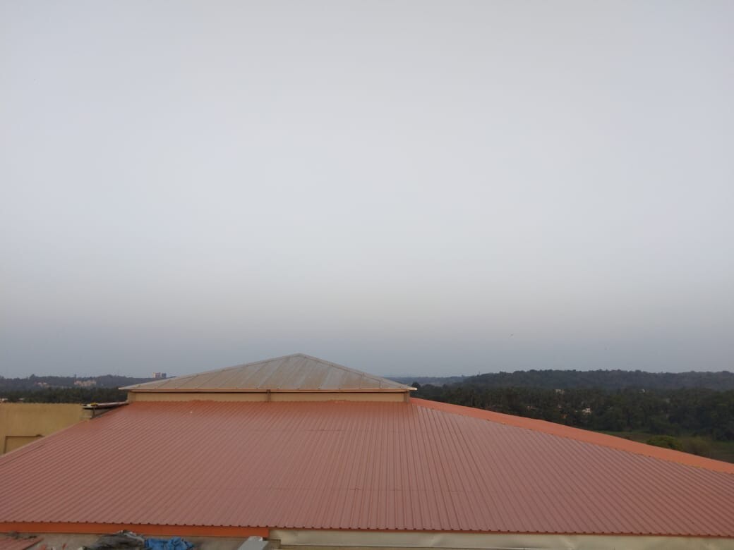 Architectural Kalzip standing seam roofing for IICC New Delhi: Specialized large-span aluminum building envelope by Rishonn & Reyansh for India's premier convention landmark.